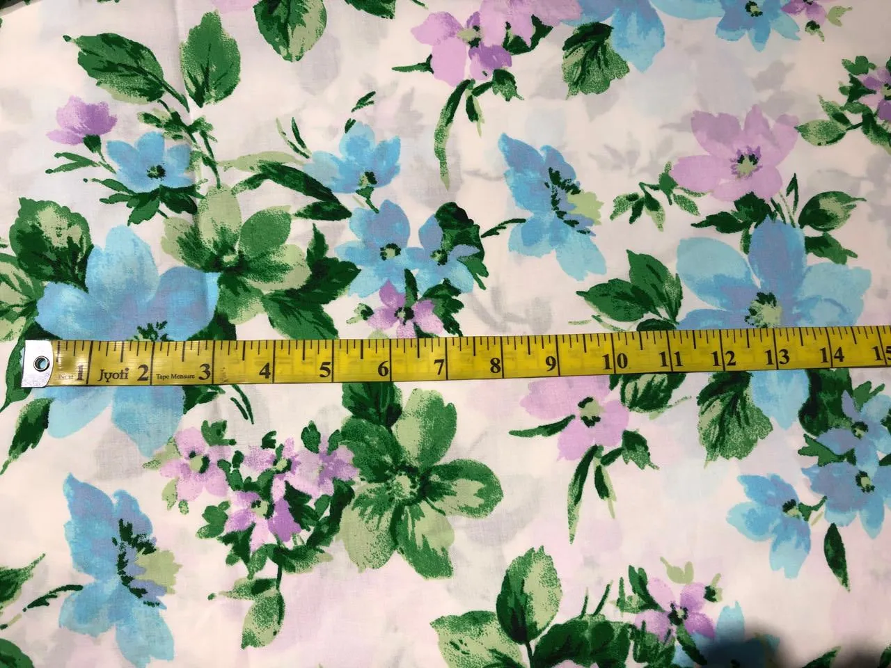 100% Cotton Poplin  Prints 58" wide available in 3 prints pastel color plaids/bunnies and cream with blue lavender floral