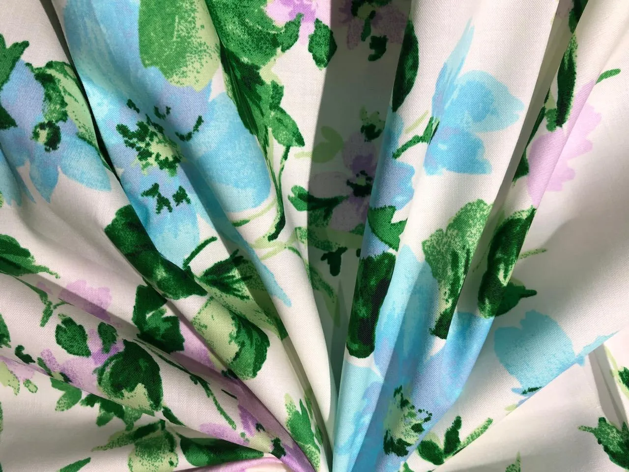 100% Cotton Poplin  Prints 58" wide available in 3 prints pastel color plaids/bunnies and cream with blue lavender floral