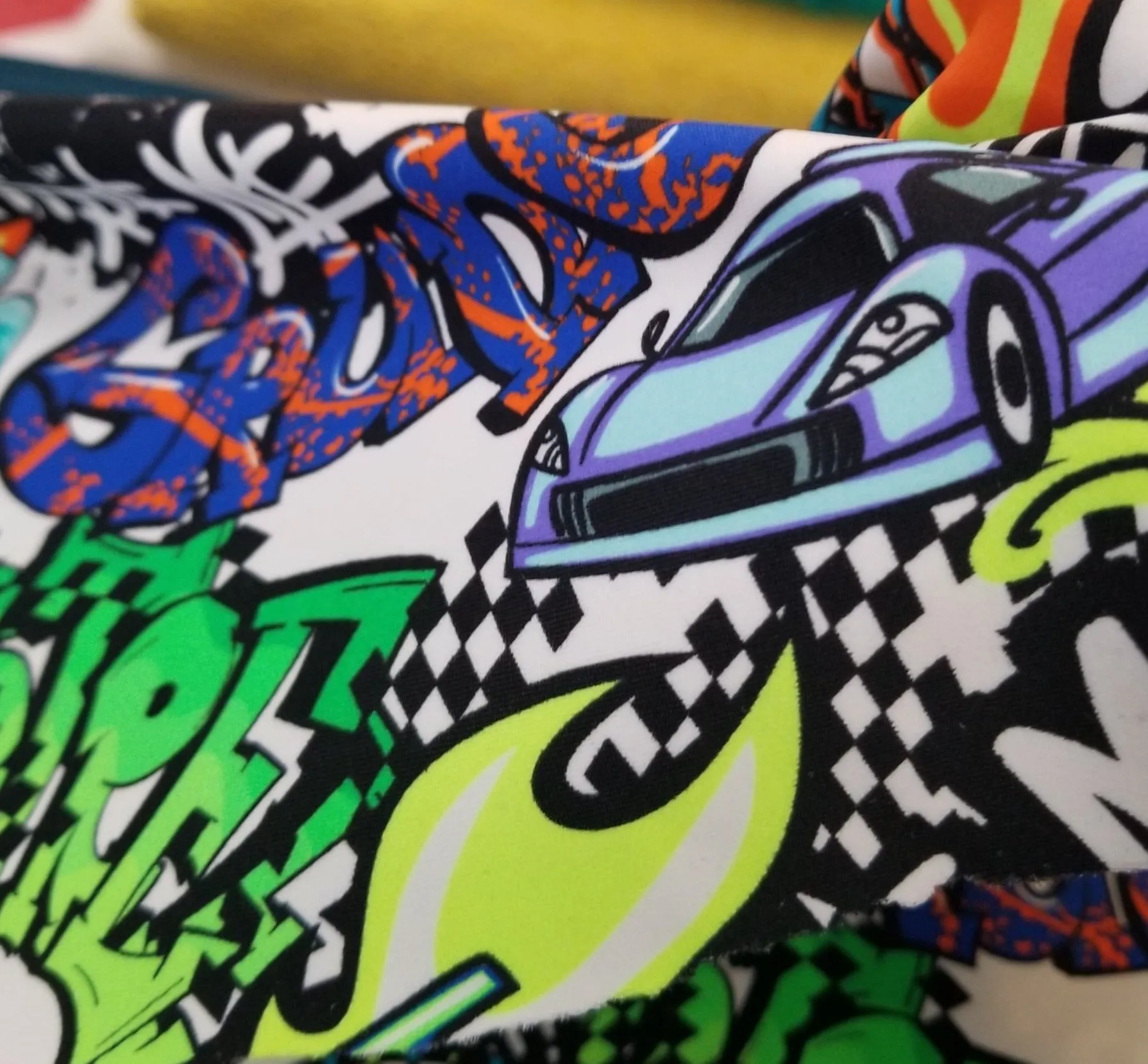 LA FINCH 5 yard precuts: 5 yards of Designer Deadstock Nylon Spandex Swim Performance Wear Graffiti & Street Racing Conversational Knit (Copy)